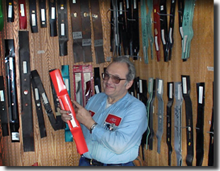 Picture of Jim holding mower blades